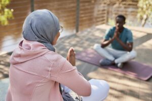 group meditating together