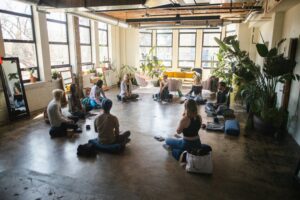 Group of meditators sitting in a circle